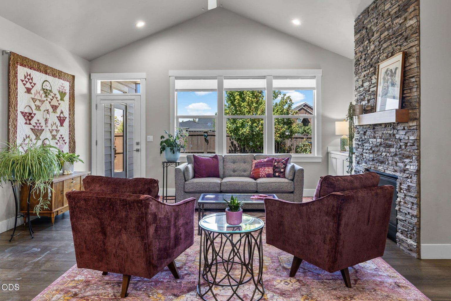 Vaulted Great room/living room facing back yard