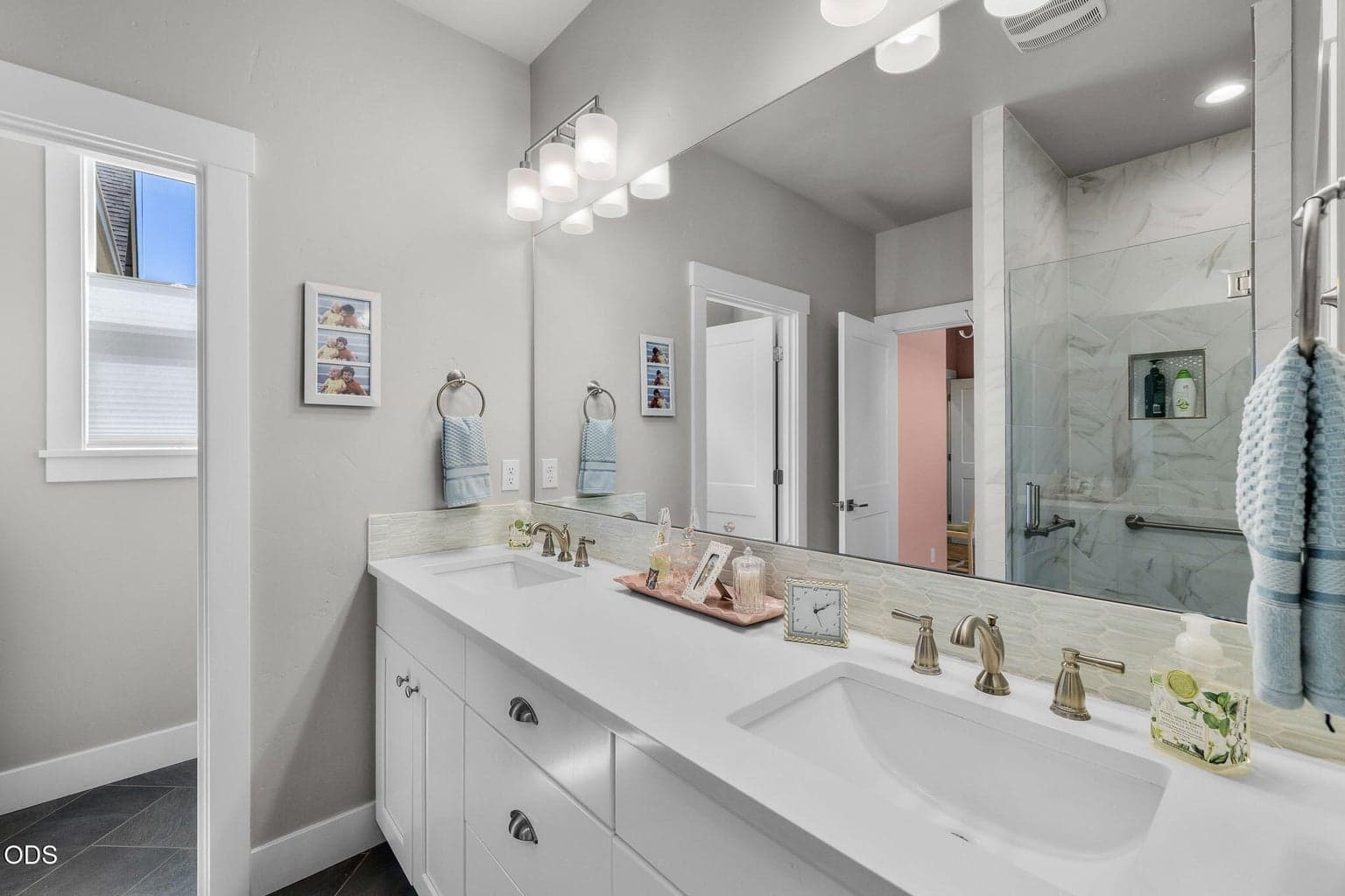 Primary bath with enclosed toilet area, heated tile floors
