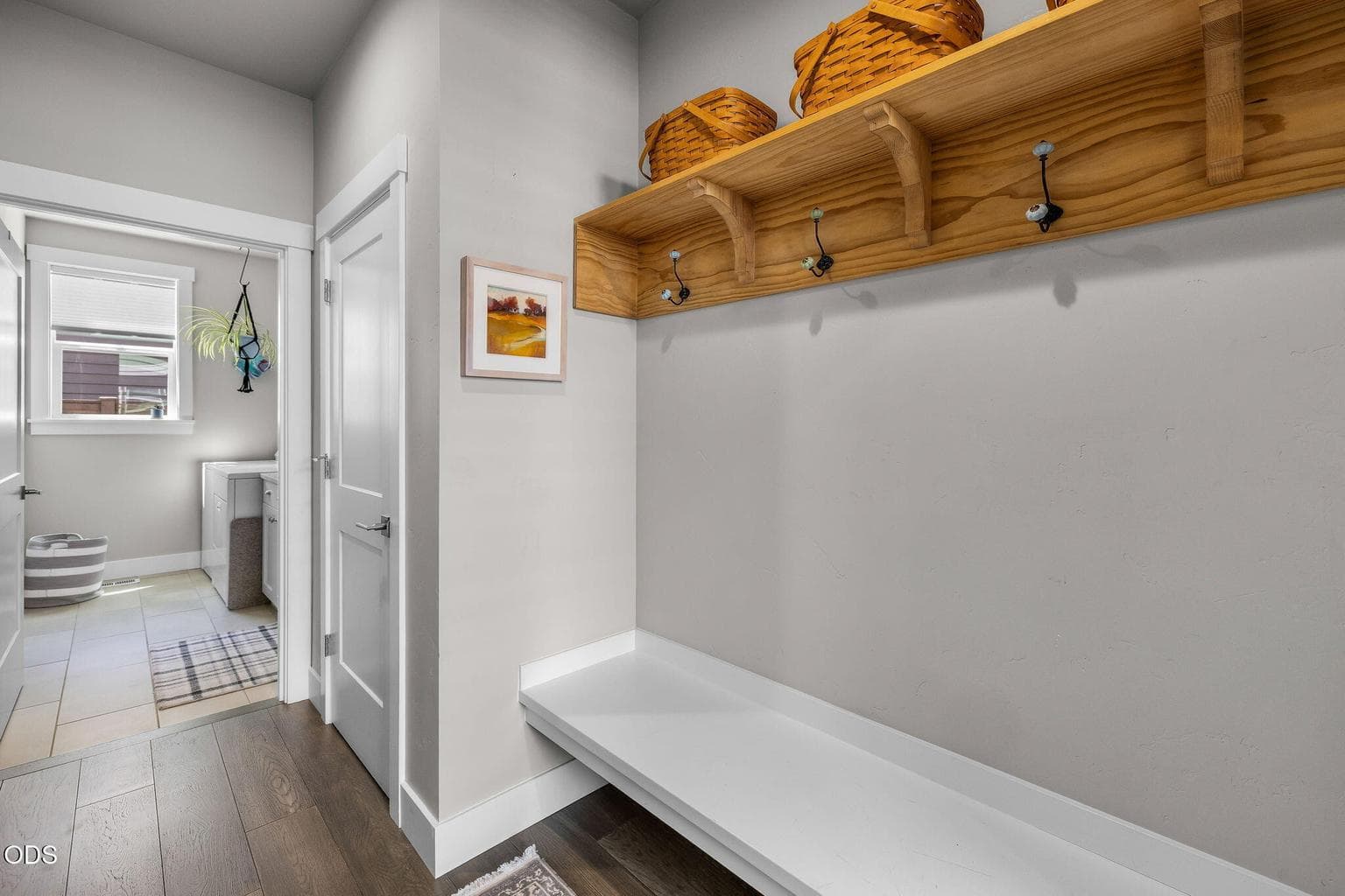 Built-in coat rack and linen closet
