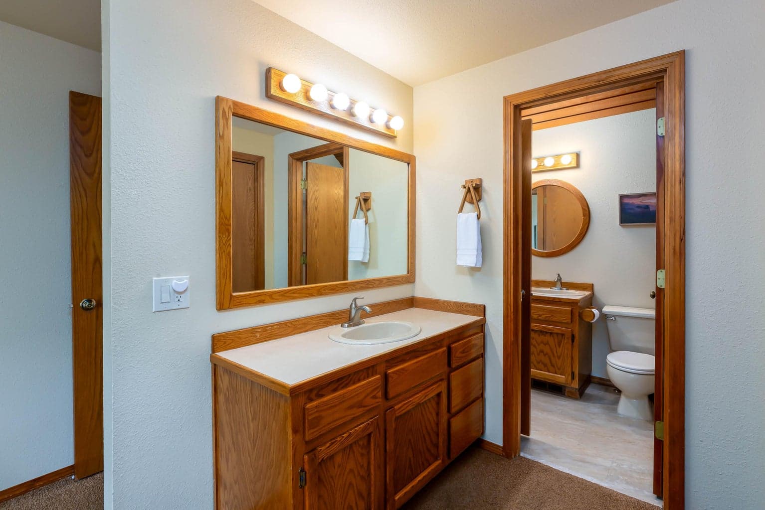The main floor bedroom has it's own sink, plus jack & jill access to the main floor bathroom
