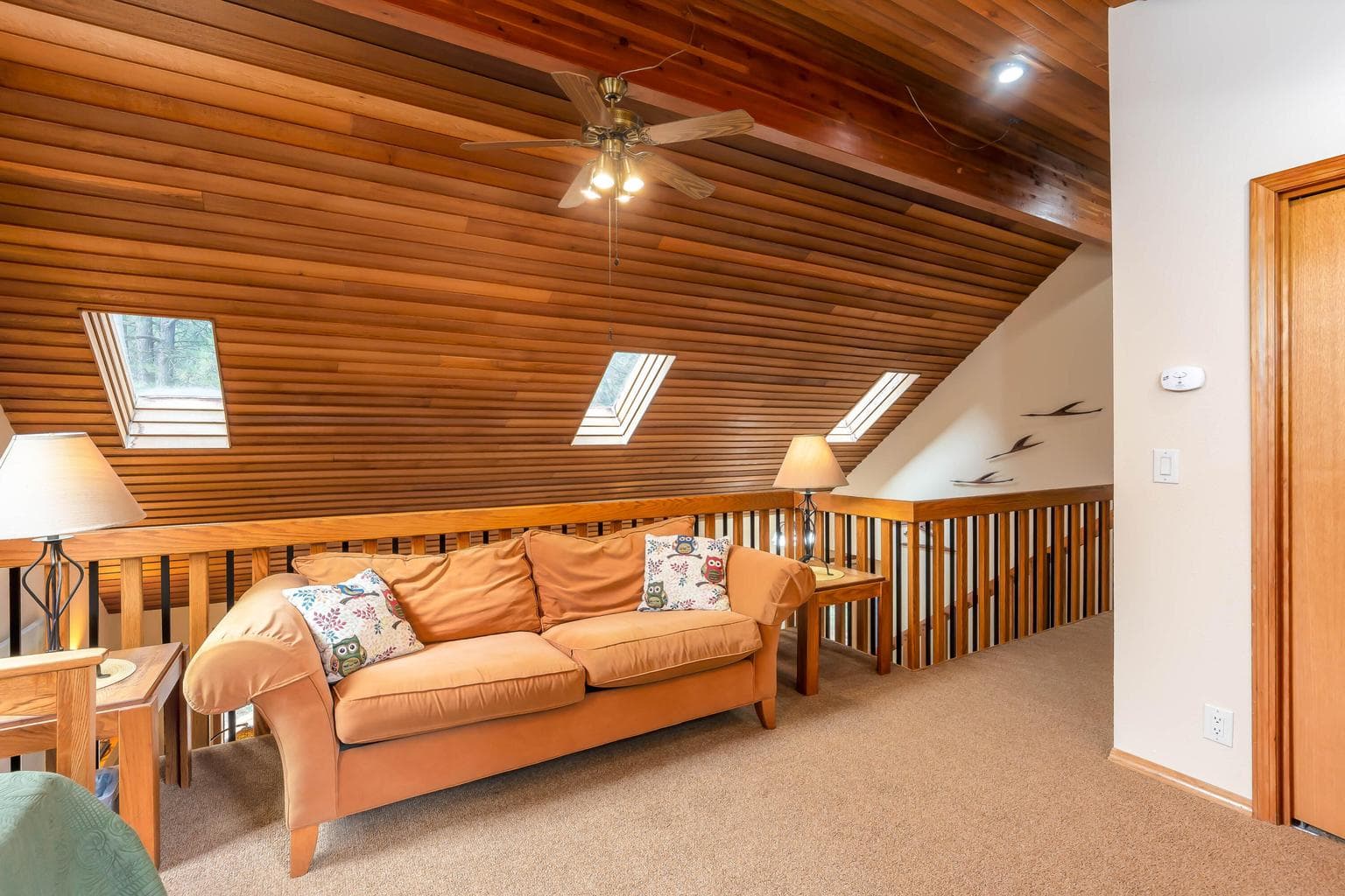 Bedroom 3 is an open loft with a day bed + trundle, extra seating and a flat screen TV