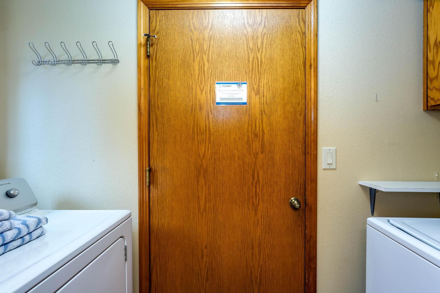 Utility room off the kitchen and garage