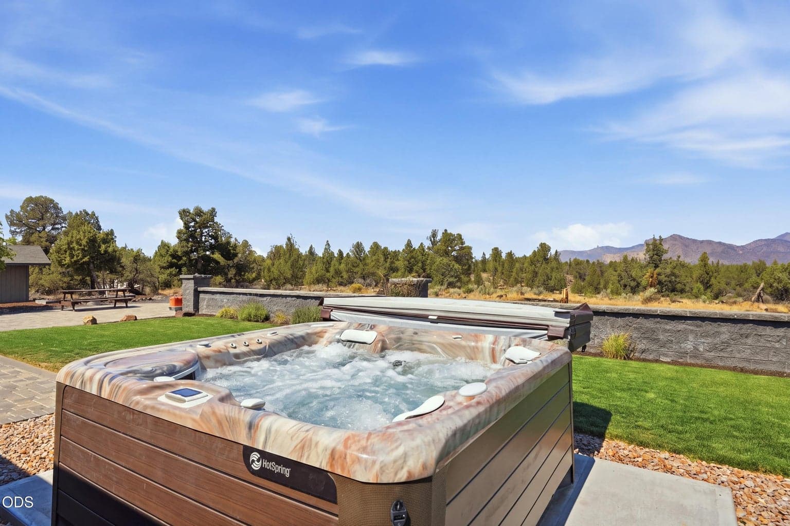 Primary doors lead to hot tub