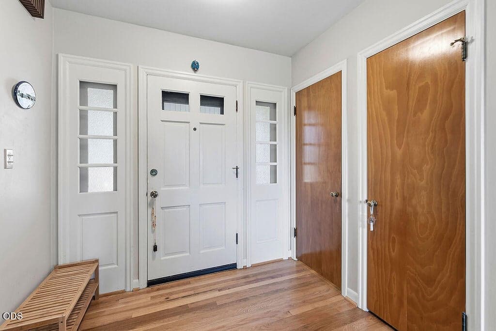 Door on the Left leads to large bathroom.