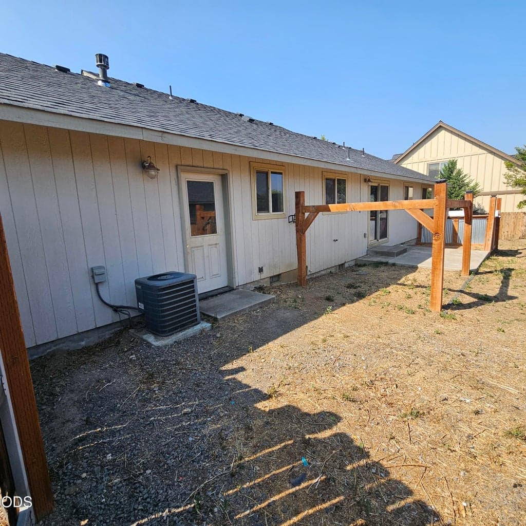 Offering both garage and dining area access to the rear yard and patio.