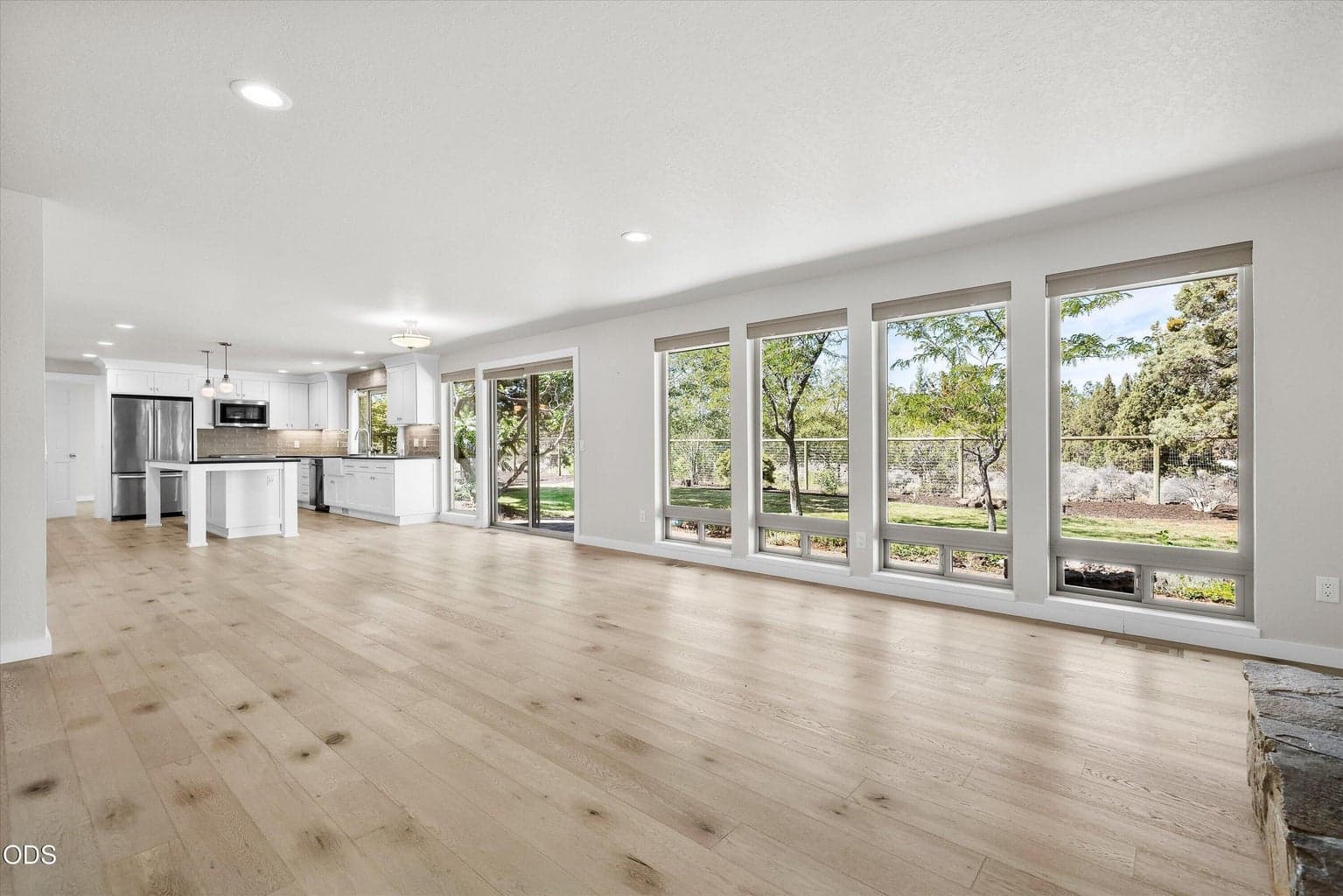 Lovely floor to ceiling windows bring in the natural light.