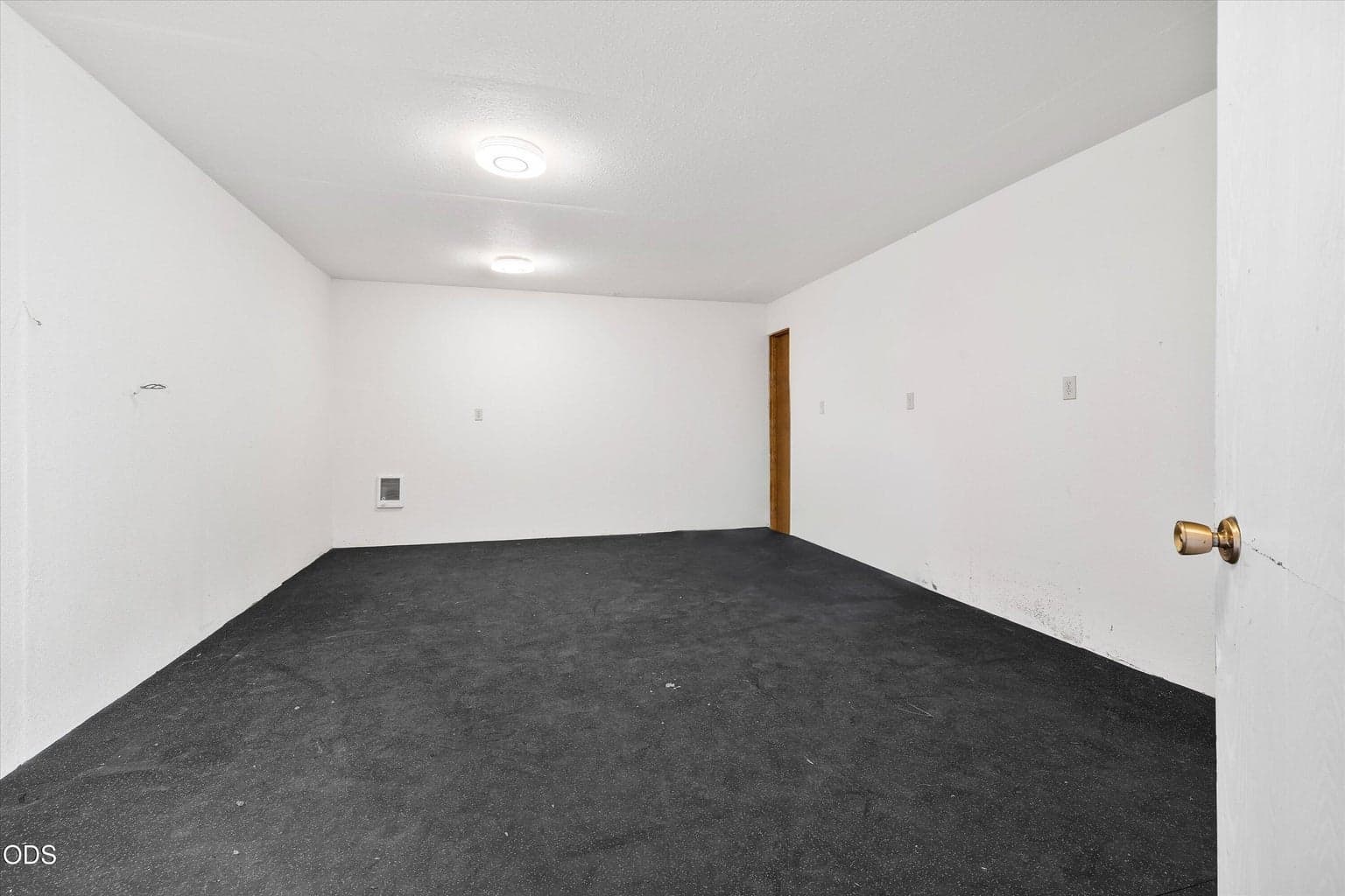 An additional finished bonus room is located in the shop.
