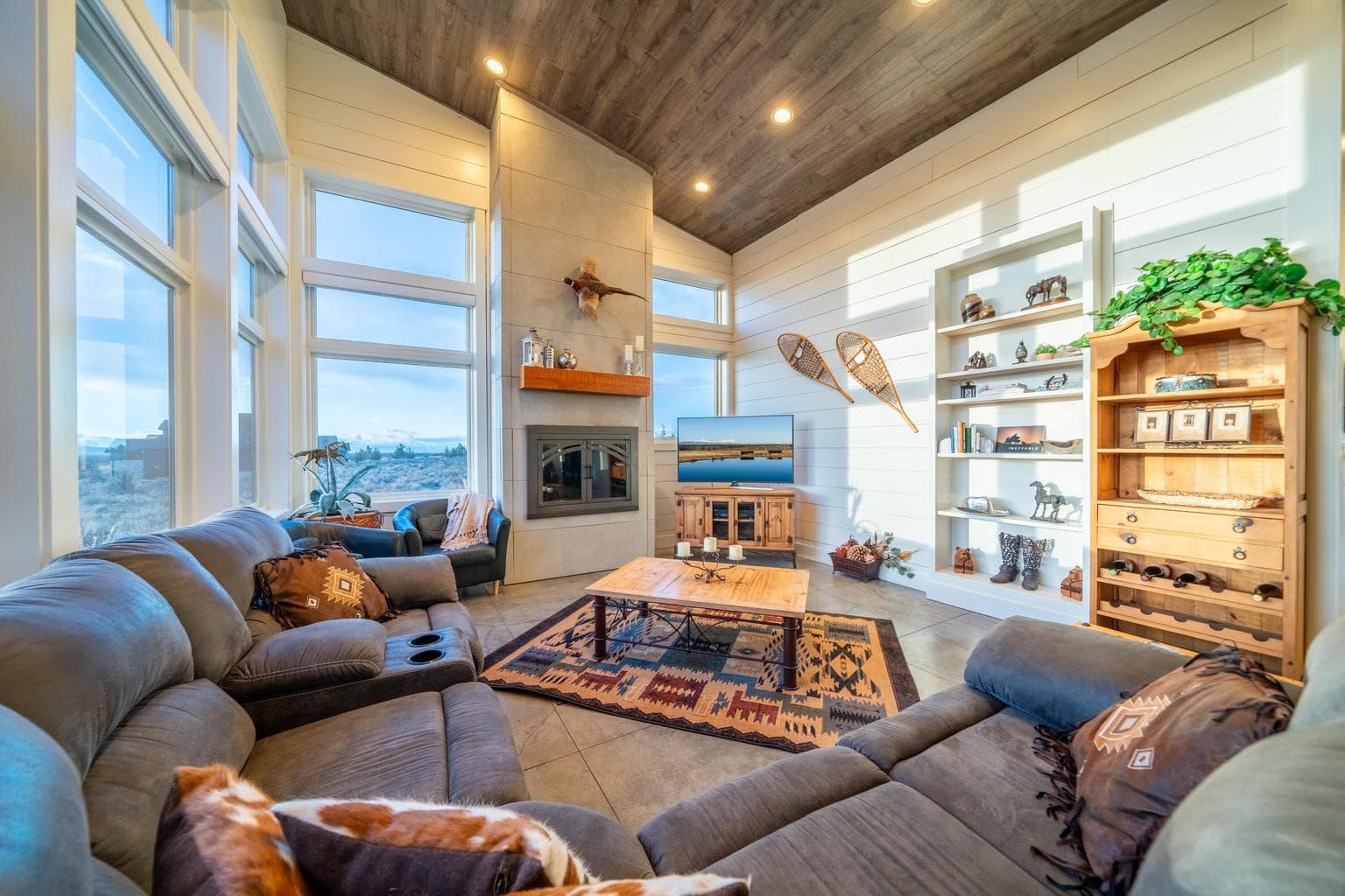 Cozy and bright during any season! Built in bookshelf!