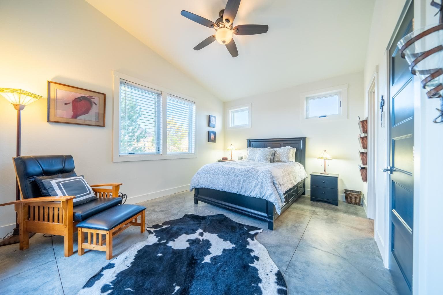 Oversized guest ensuite with private patio access from double french doors