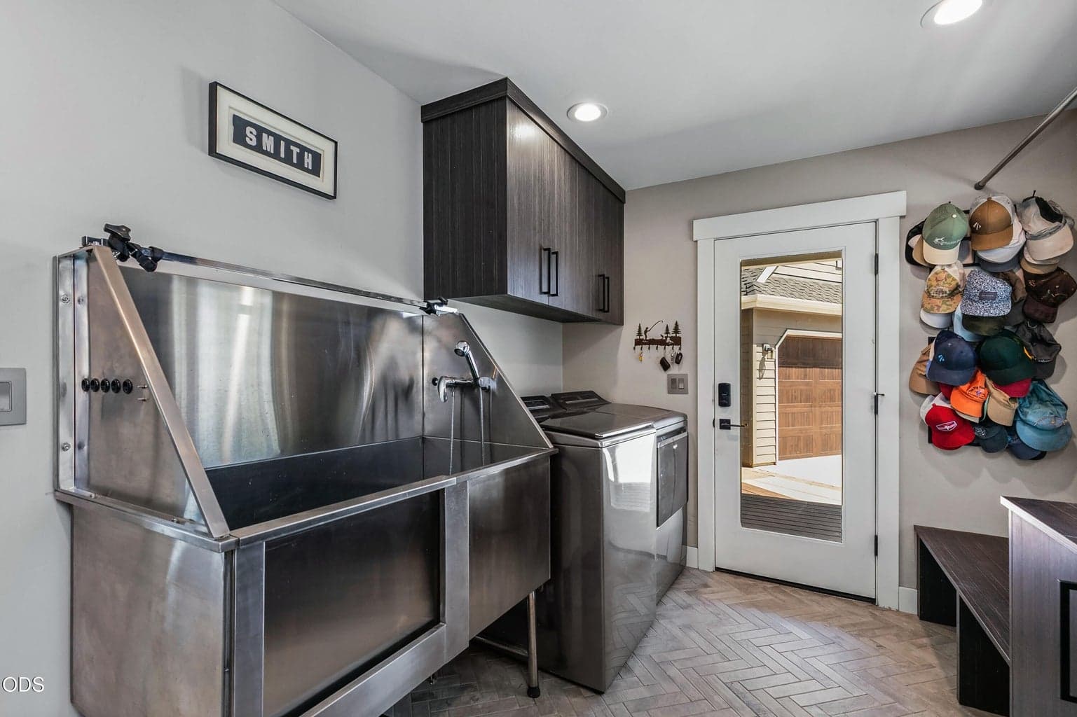 Mudroom/Utility Rm complete with dog wash station