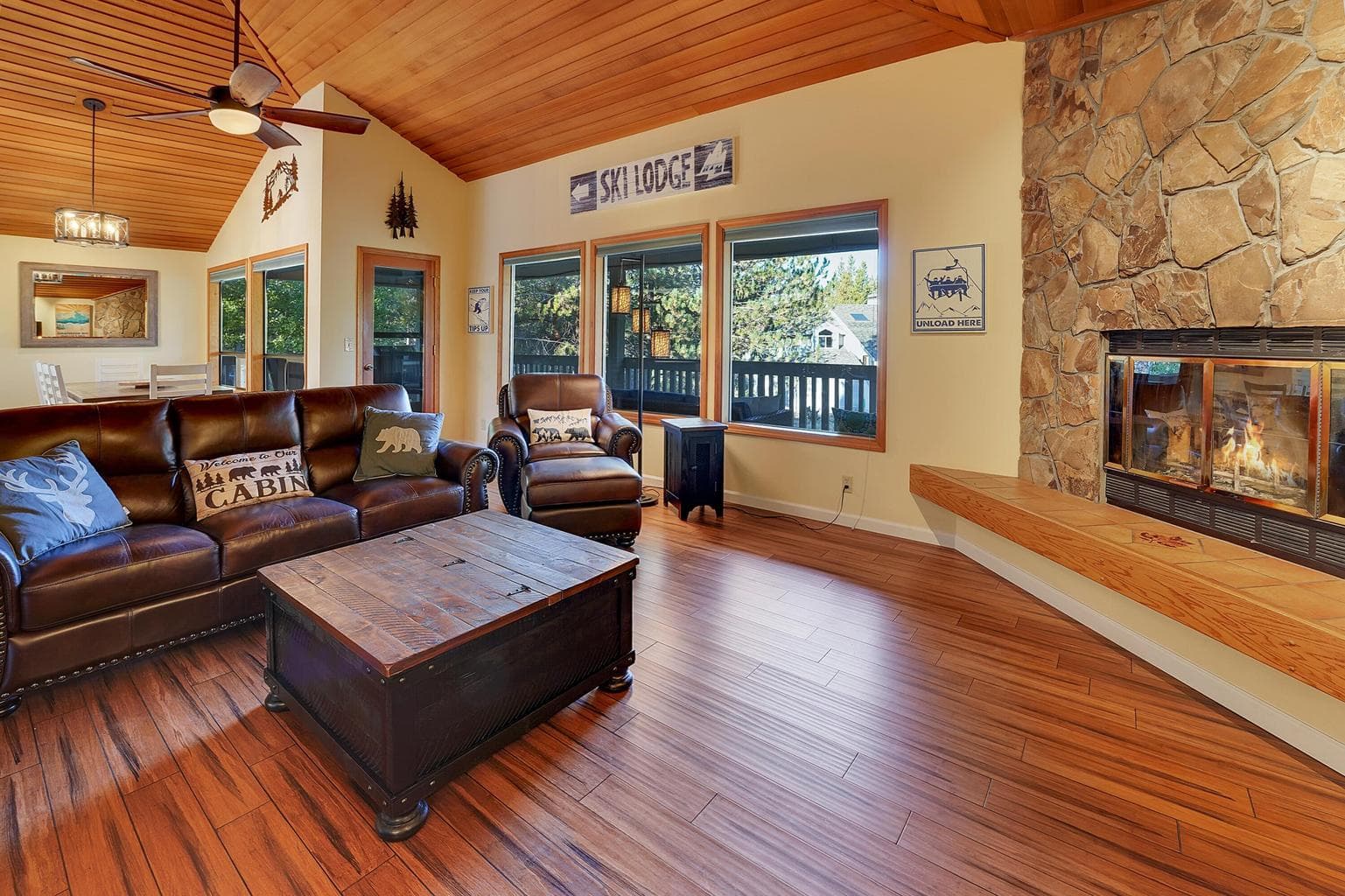 Upstairs Living Room with Fireplace & Forest Views