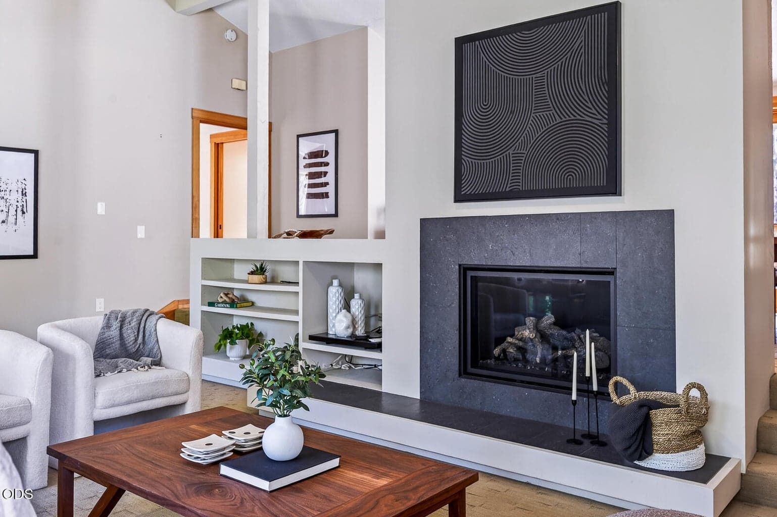 This home is primarily one level. The living room is the only room that is just slightly lower (3 steps down from the dining room)