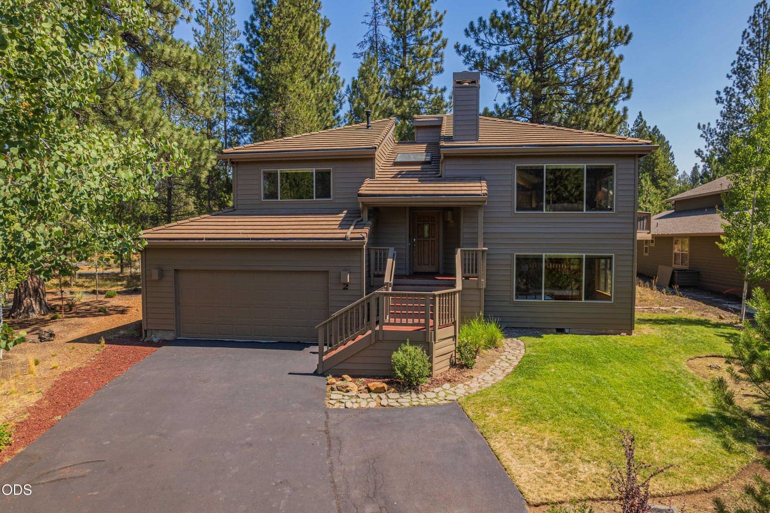 Set among mature pines, this welcoming Sunriver home offers space to gather, relax and explore.
