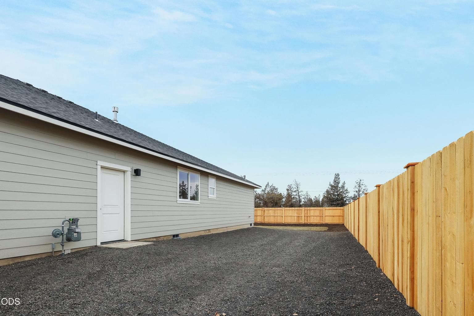 Photo of different lot - only for reference. Lot 52 side yard approx 14' wide