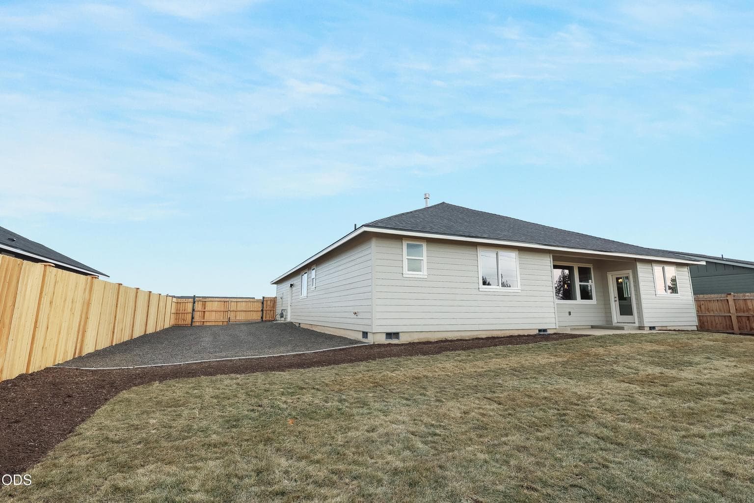 Photo of different lot - only for reference. Lot 52 side yard approx 14' wide