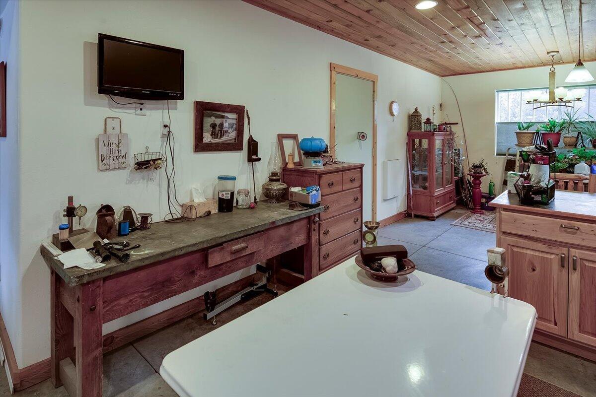 Dining area and door to shop bay.