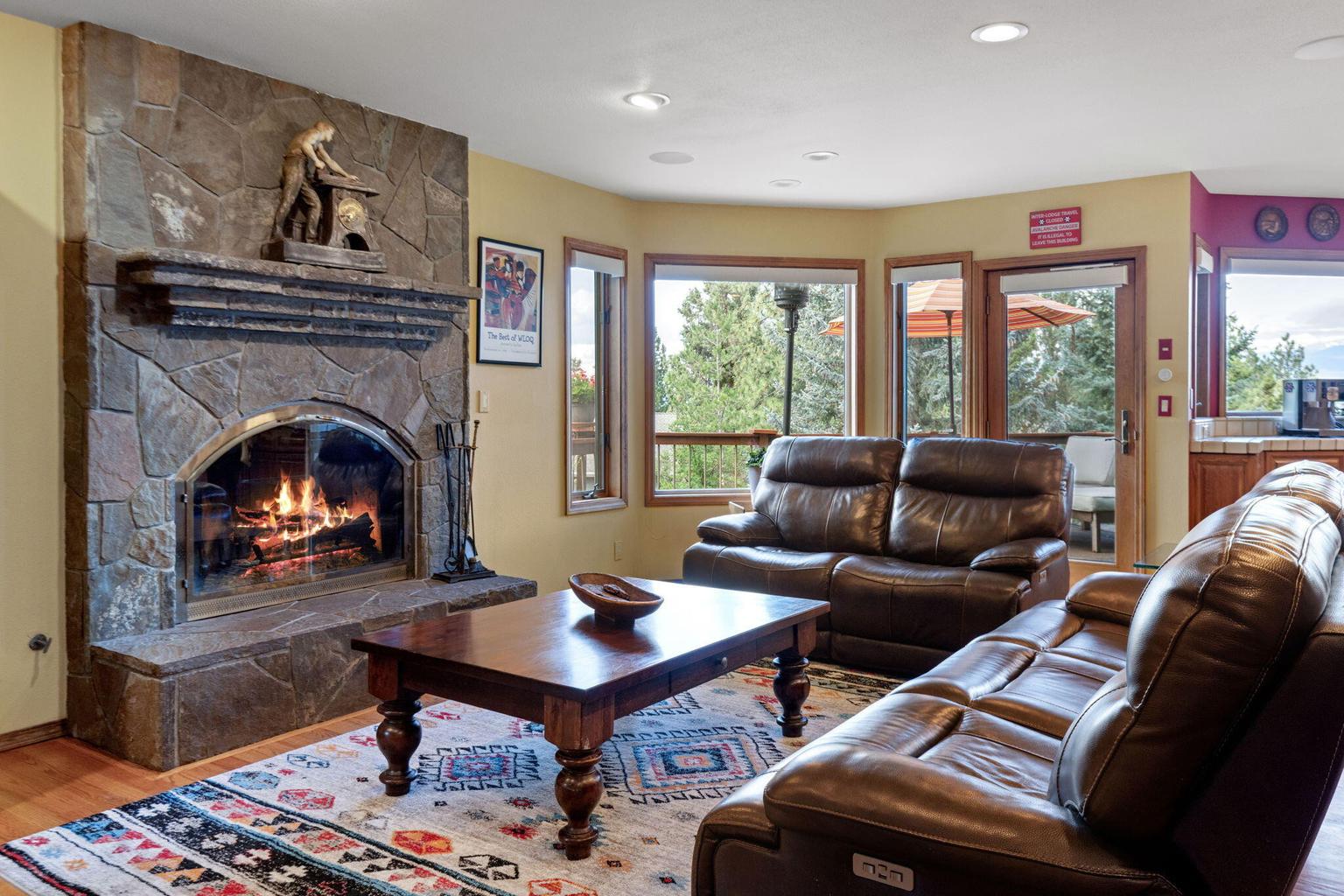 Curl up in the cozy family room next to the wood-burning fire place