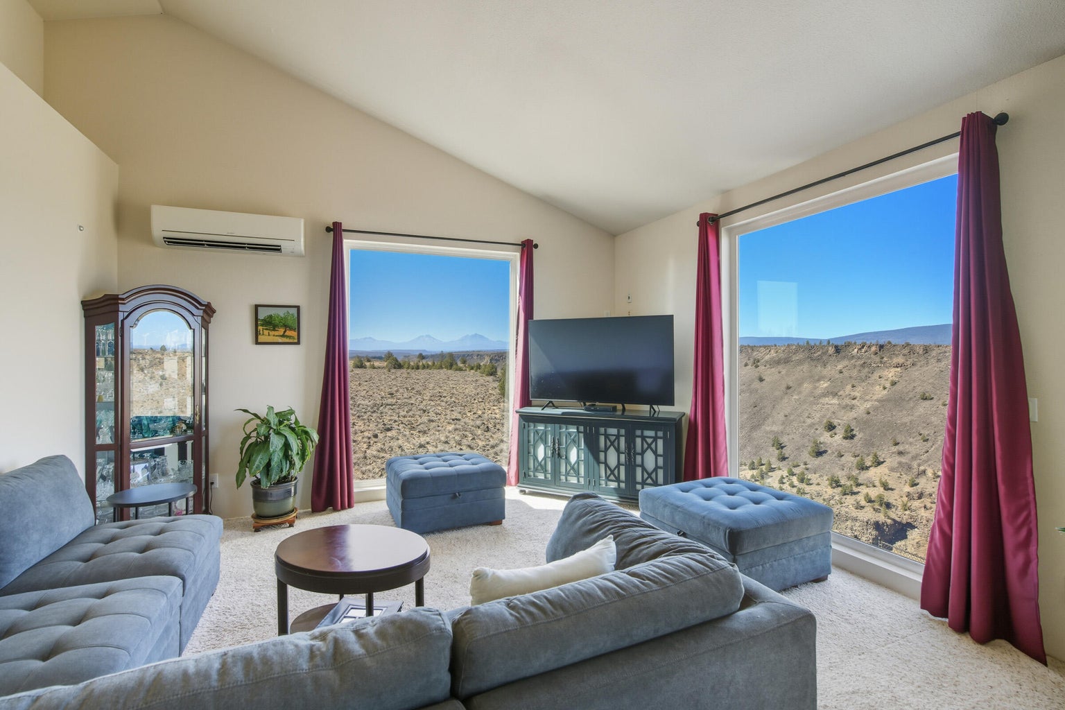 Floor to ceiling windows maximize views of the mountains and canyon