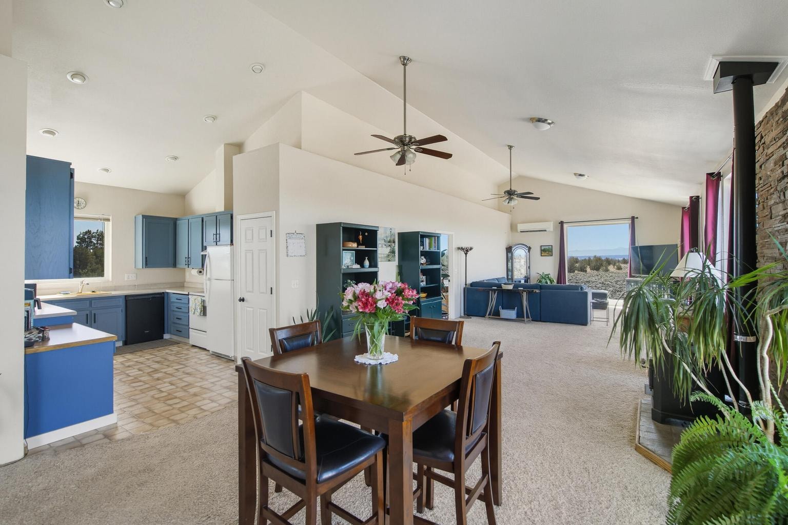 Open floorpan, Vaulted ceiling with ceiling fans and alcove kitchen