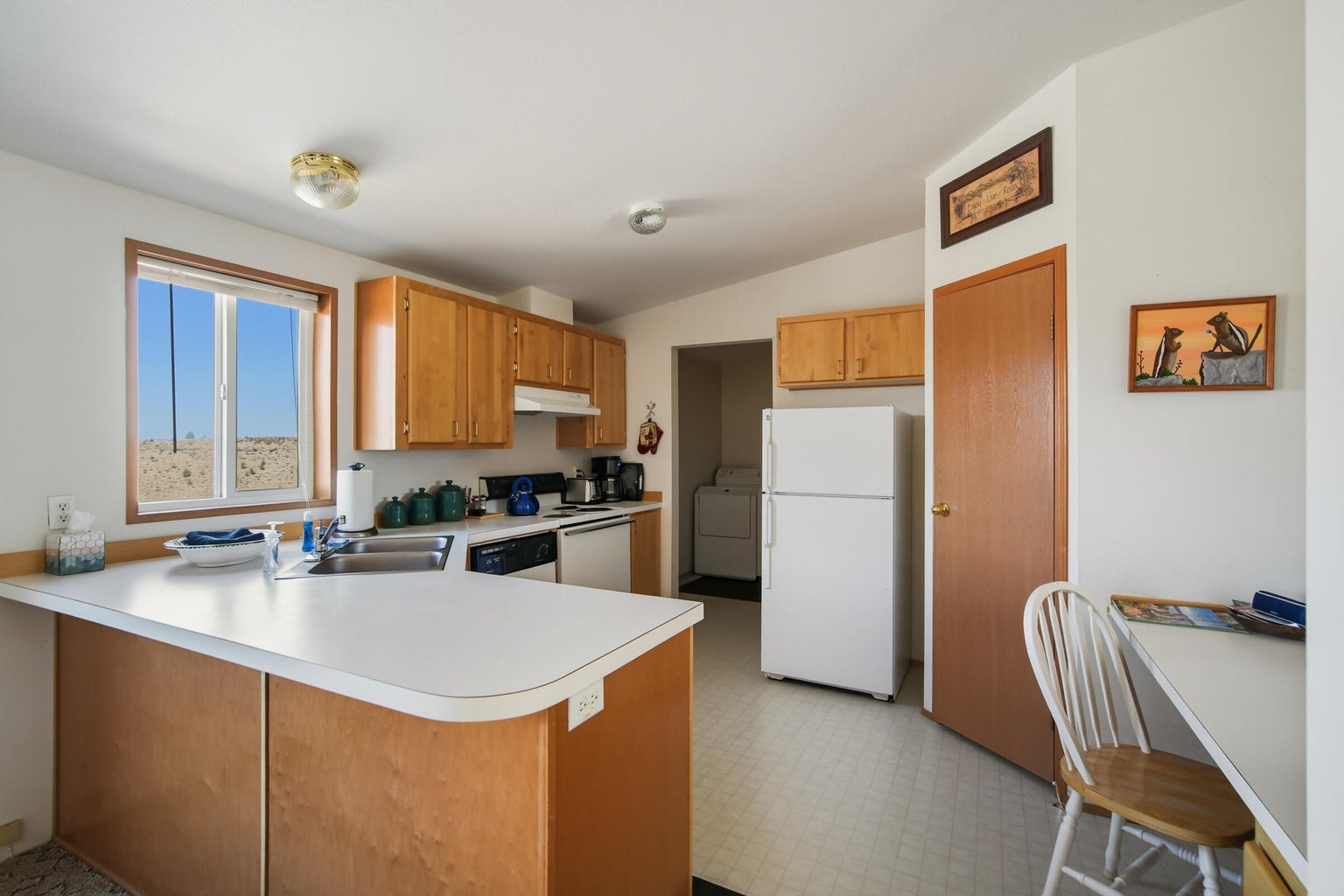 lots of counter space with nice pantry in manufactured home kitchen