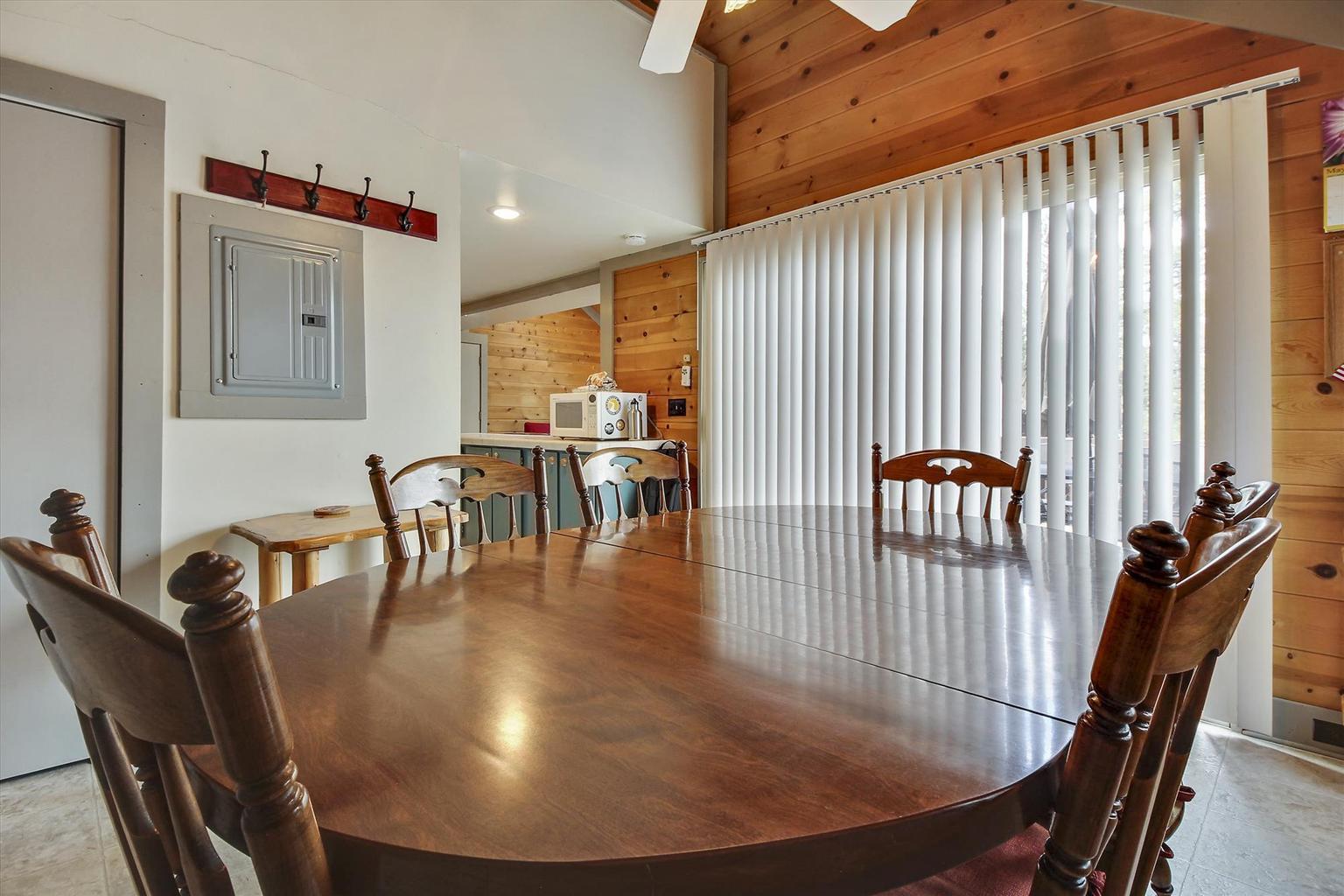 The charming dining area provides the perfect spot for family dinner and game nights.