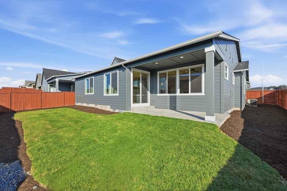 Subject property rear yard with upgraded landscaping and irrigation system