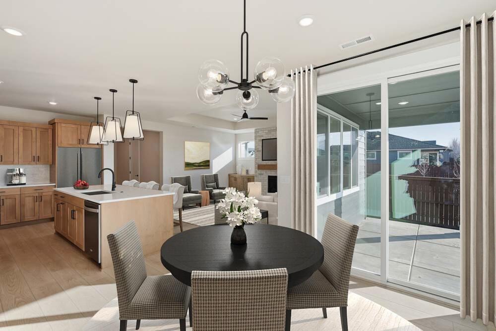 Dining to kitchen with virtual staging.