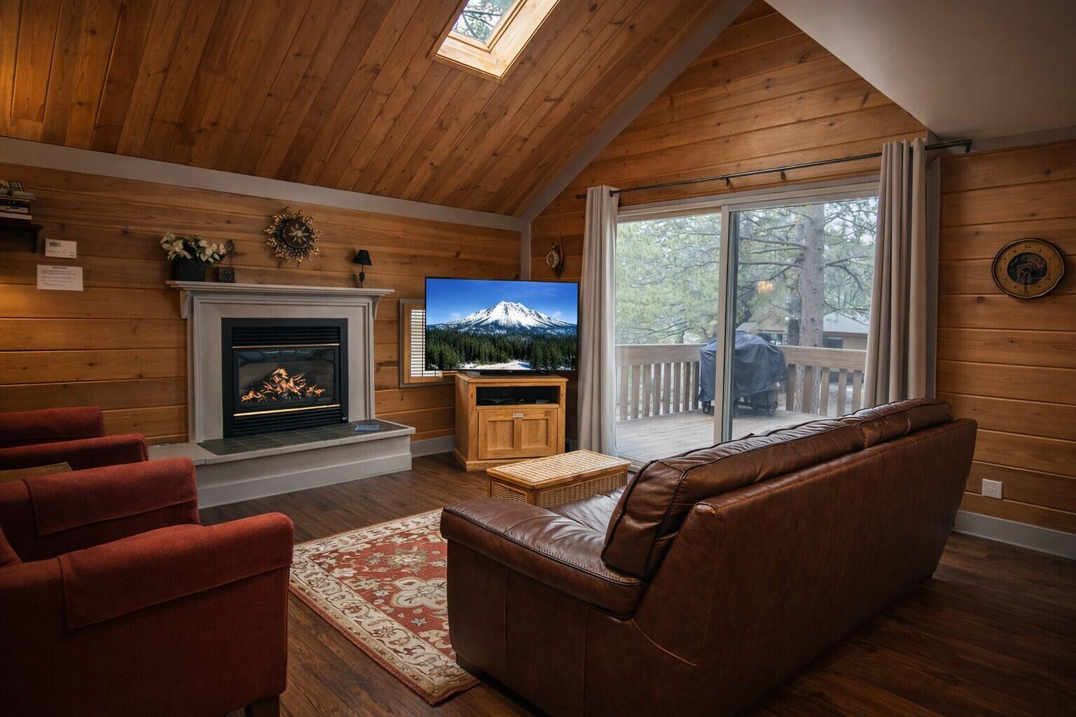 Large glass door invite natural light into this cozy gathering space.