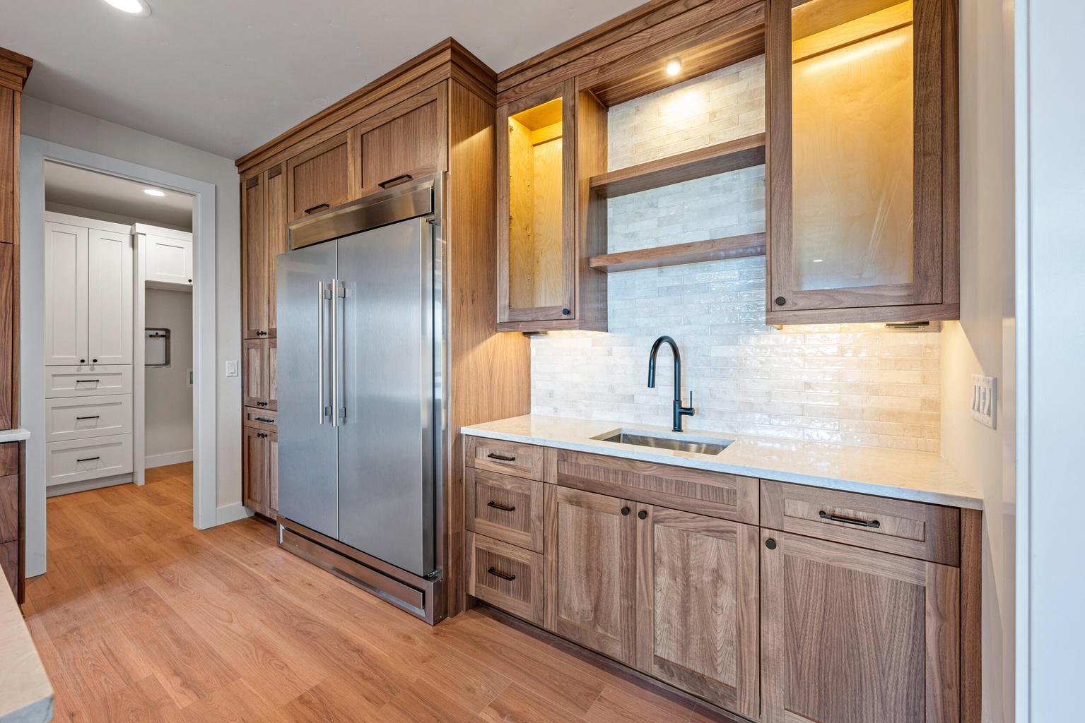 Custom Walnut Cabinets, Prep Sink and Professional Refrigerators