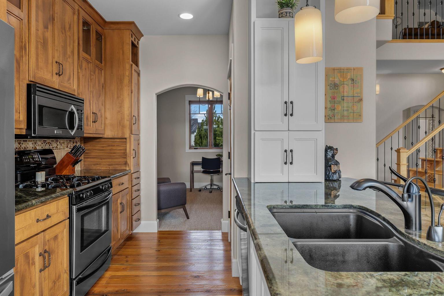 View to the Flex Space, ample storage with 3 pantries.