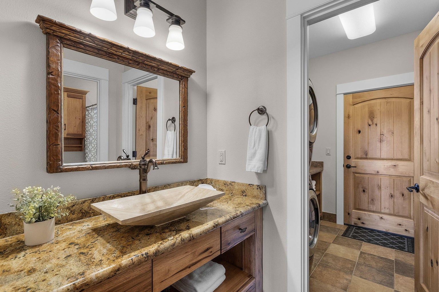 Coming in from the Garage, this sink is situated for easy clean up after projects.