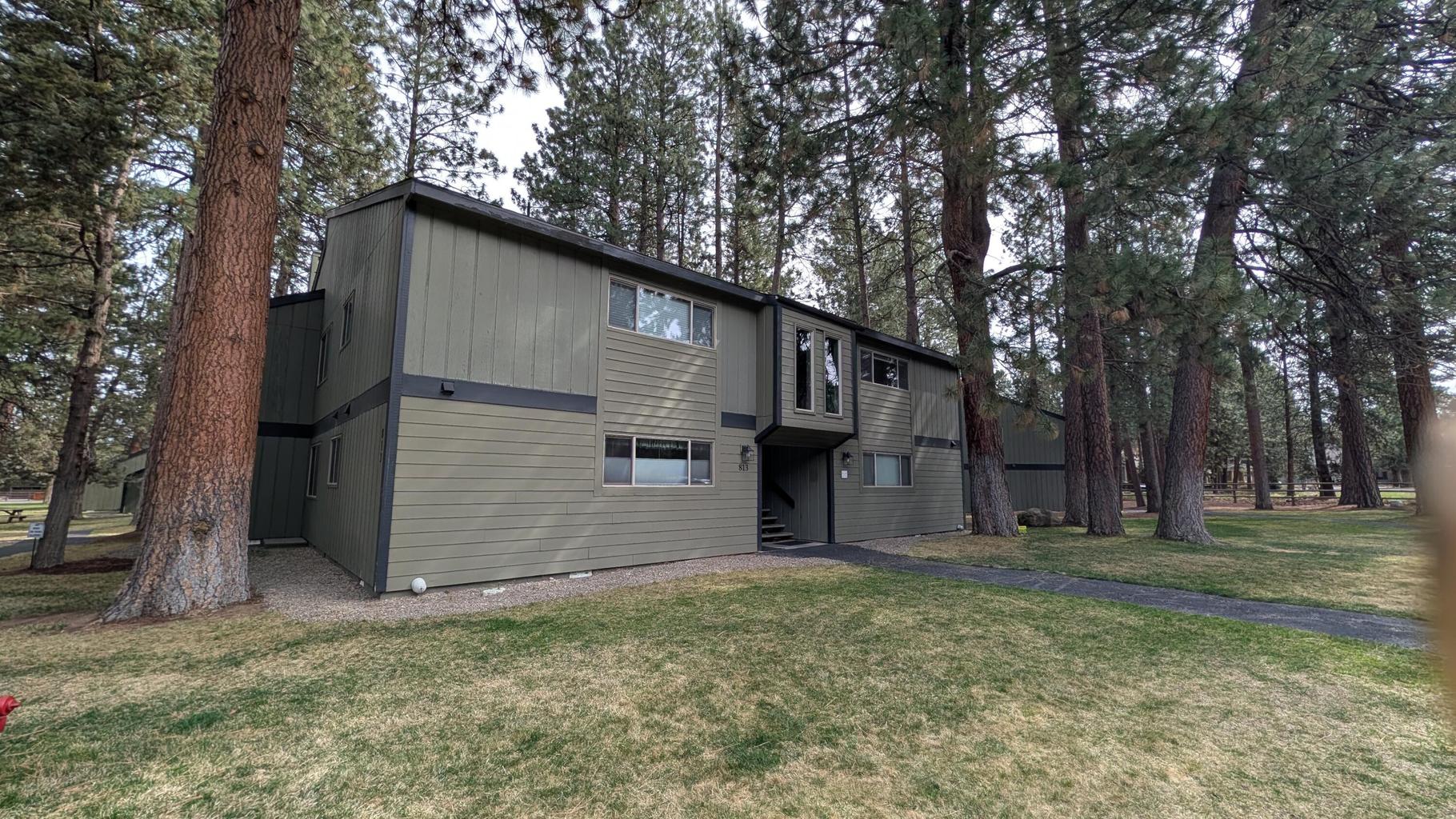 Main Level Corner Unit (far right) with Covered Fenced Deck
