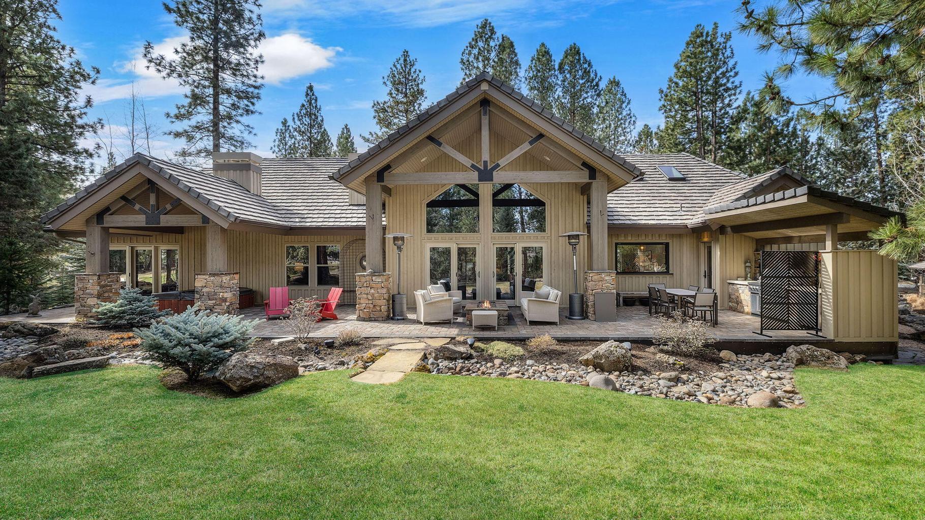 Set on nearly half an acre and thoughtfully positioned above the fairway, the home captures filtered views of the lake and clubhouse beyond—creating a sense of both connection and seclusion.