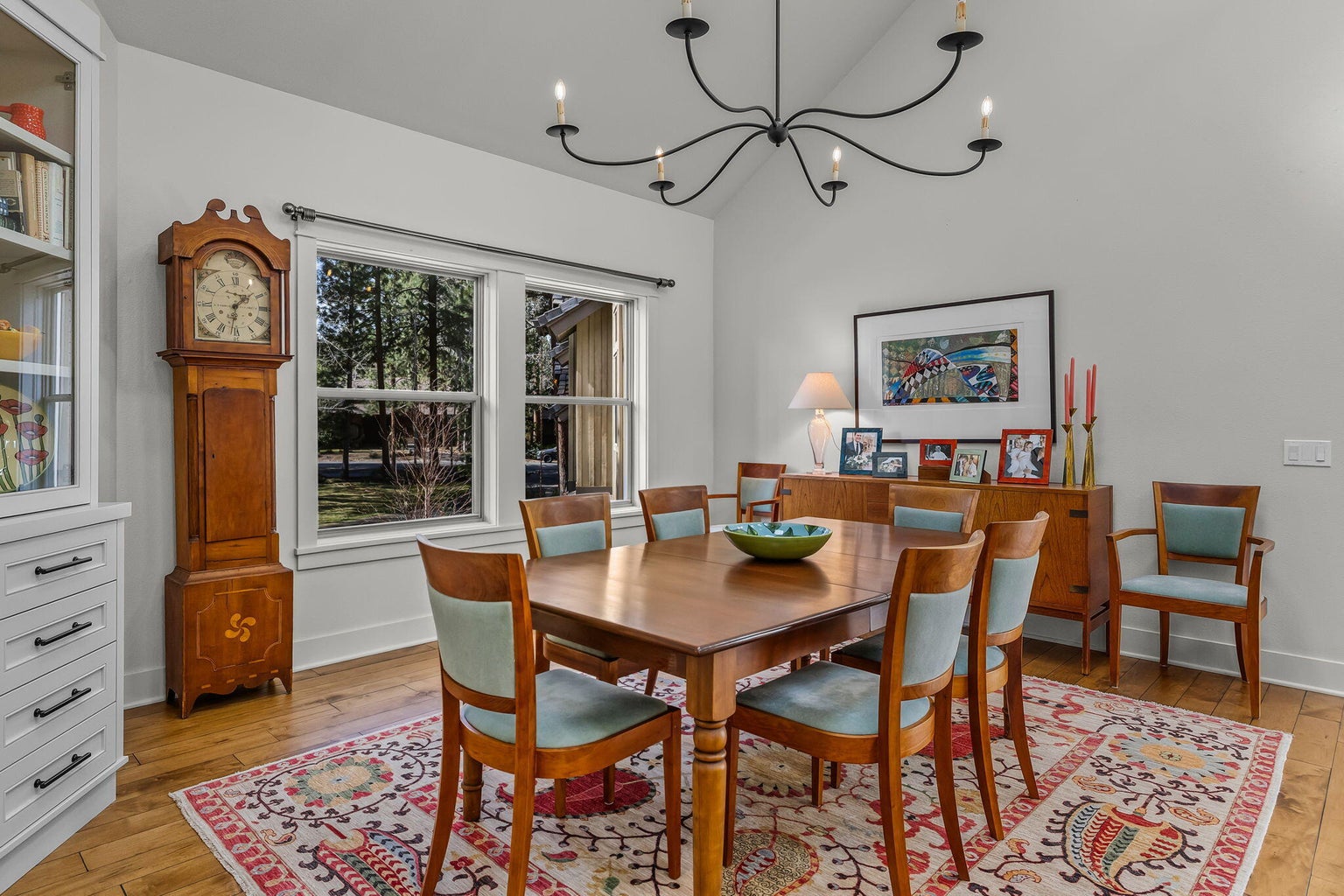 Bright dining space overlooking the front lawn, open to the great room and connected to the kitchen for effortless flow.