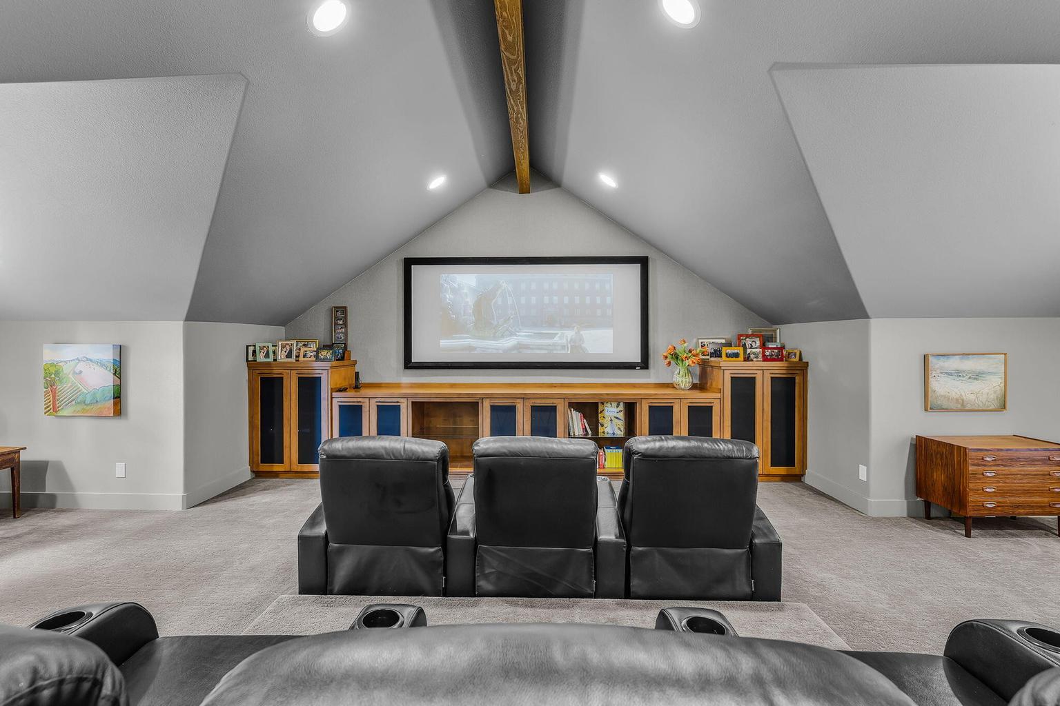 Theatre Room with built-in tiered seating.