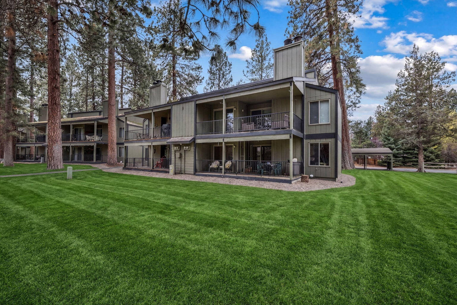 Lower right corner location backing to beautiful green space and ponderosa pines.