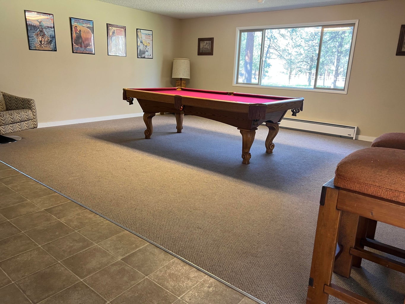Pool cues near the washer in the condo!