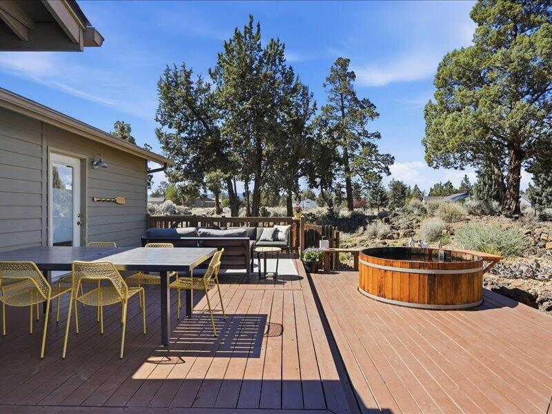 Solar powered Cedar Electric Hot tub with Mt. views through the trees
