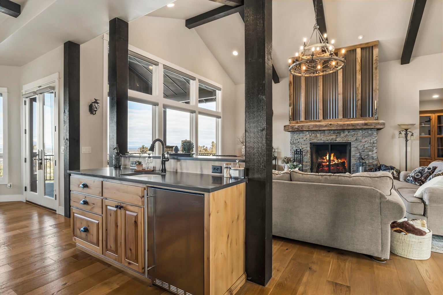 Wet bar with mini frig and ice maker.