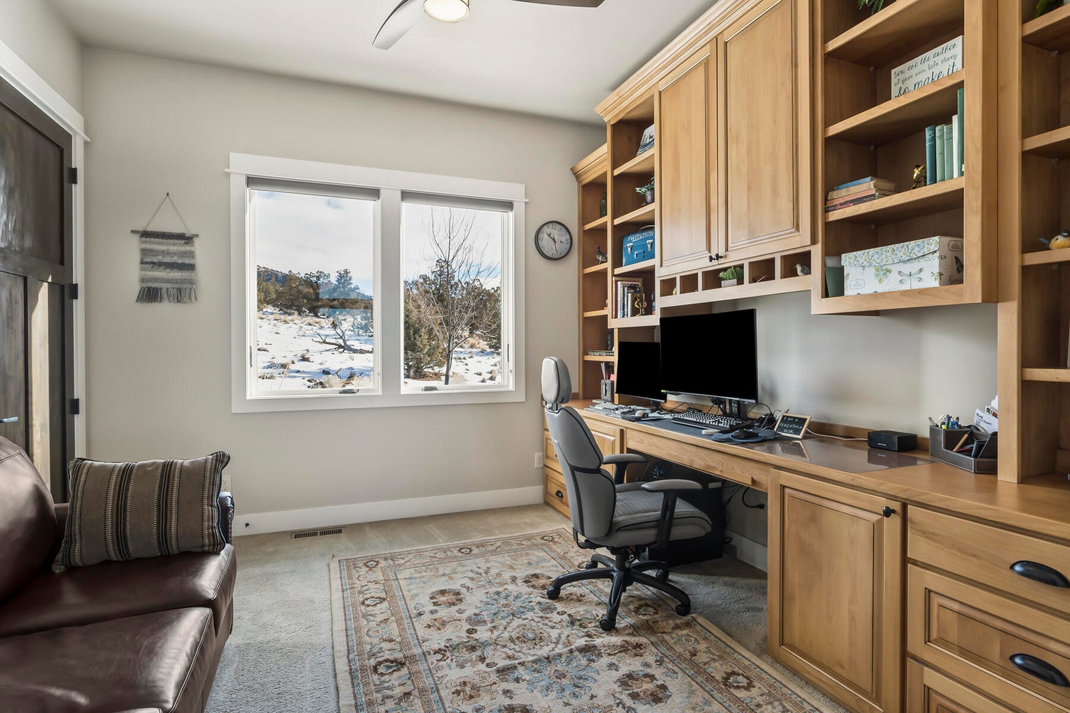 Office with peninsula desk, could be used as additional bedroom