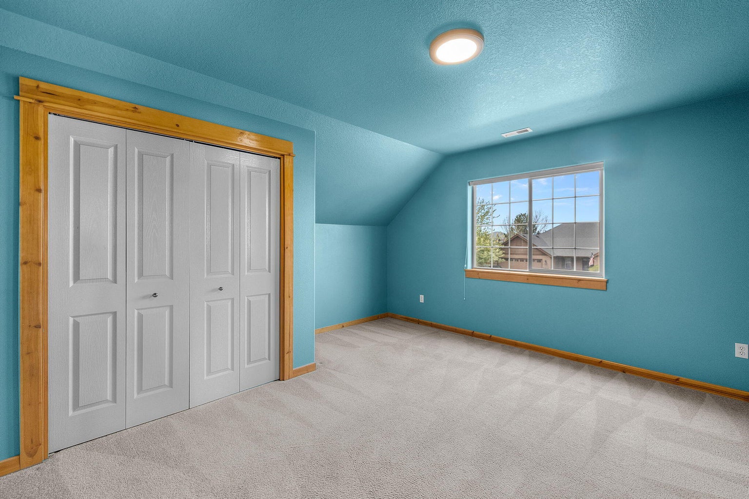 West facing bedroom with a mountain view