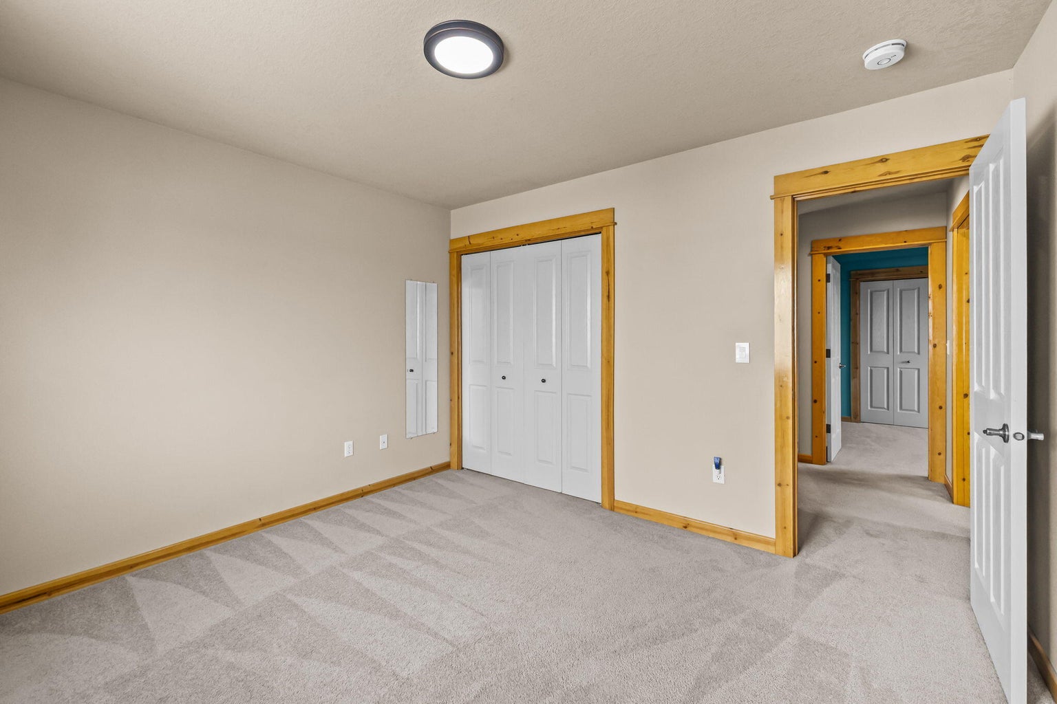 Bedrooms are separated by the full bath