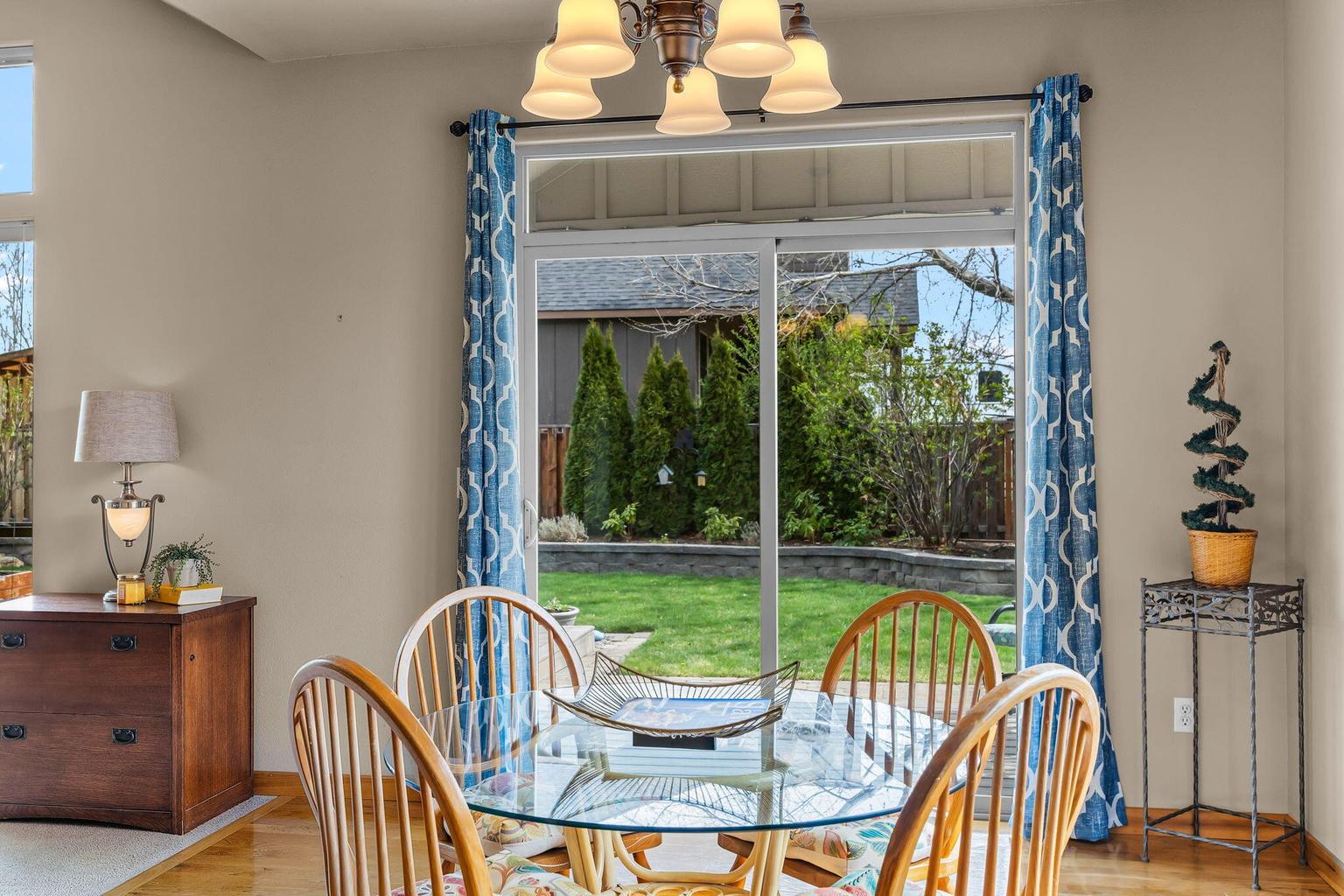 Dining opens to covered deck for entertaining!