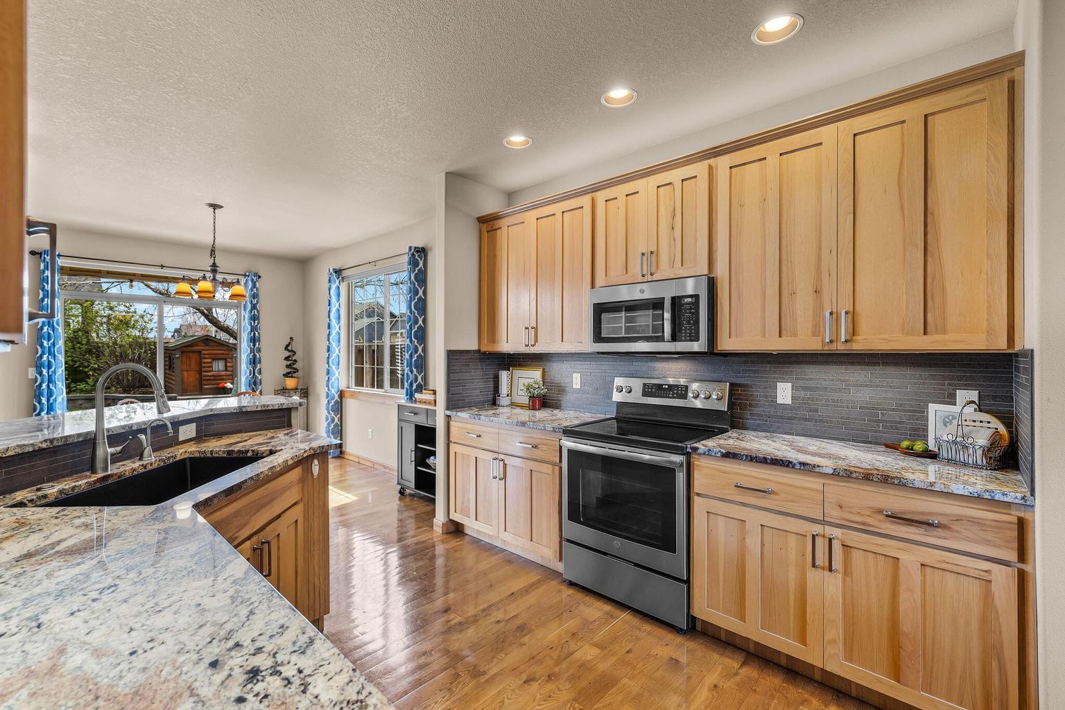 Wood cabinets with ambient and under cab lighting