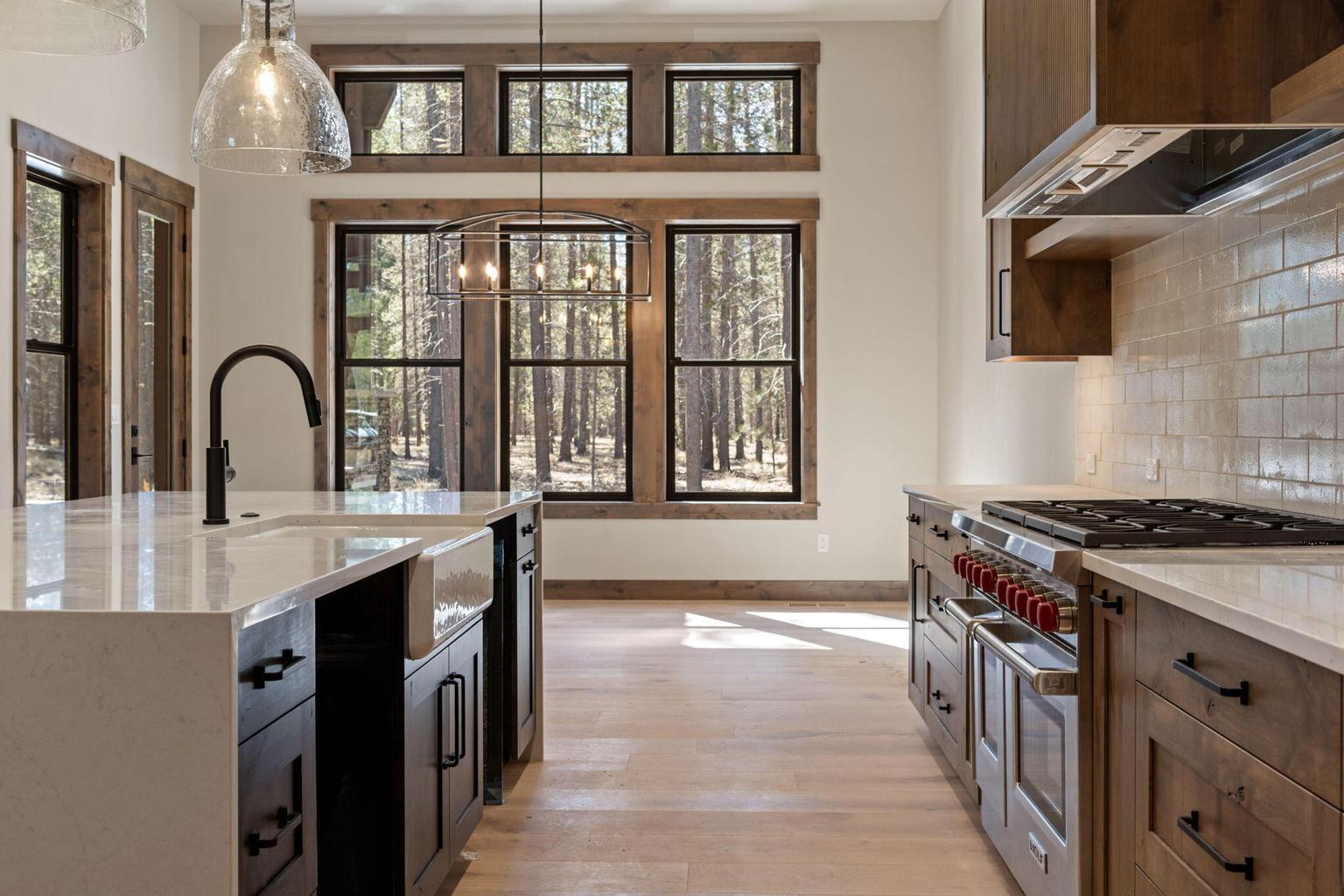 Custom cabinetry surrounds the Wolf 48" 8 burner gas range