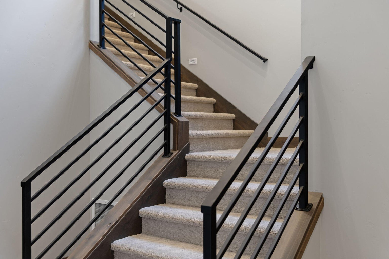 Custom ironwork staircase rail