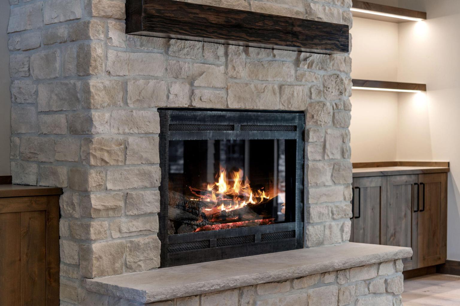 Limestone hearth and custom mantle