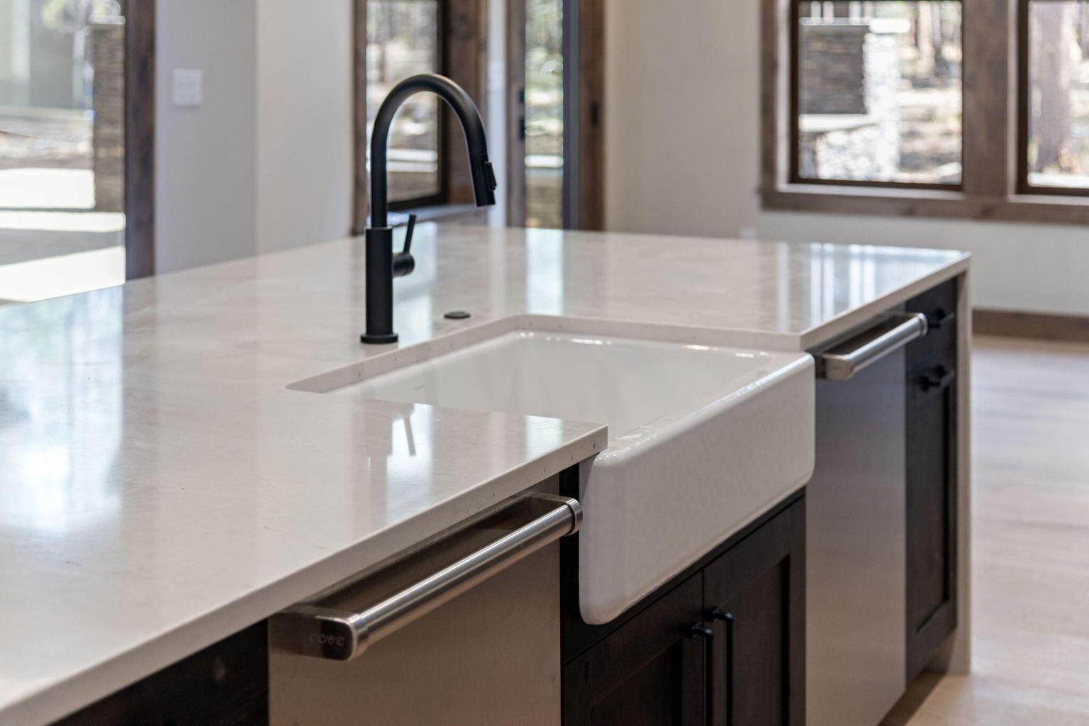 Two Cove 24' dishwashers surround the Farm sink