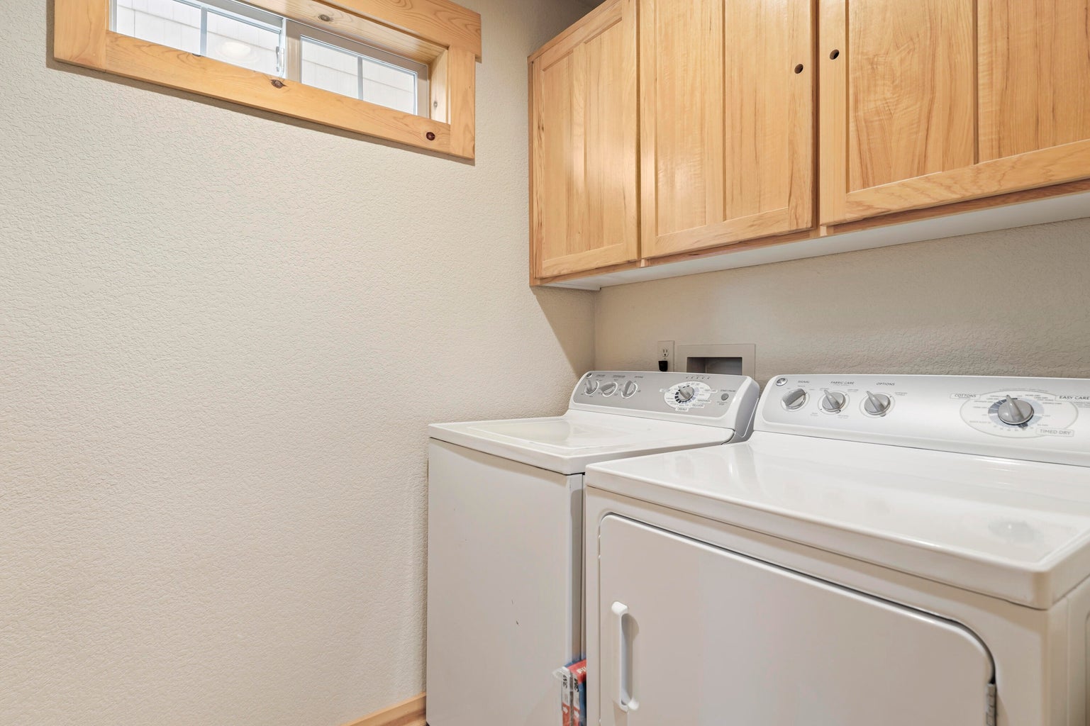 Utility Room on Main Floor next to primary bathroom
