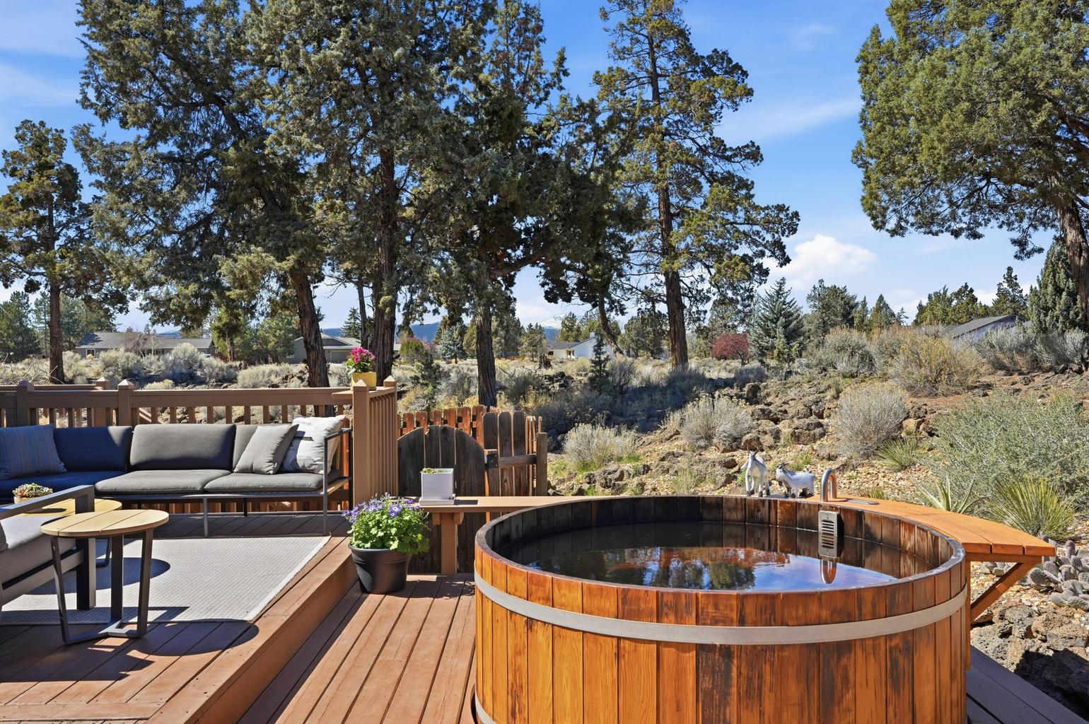 Solar powered Cedar Electric Hot tub with Mt. views through the trees